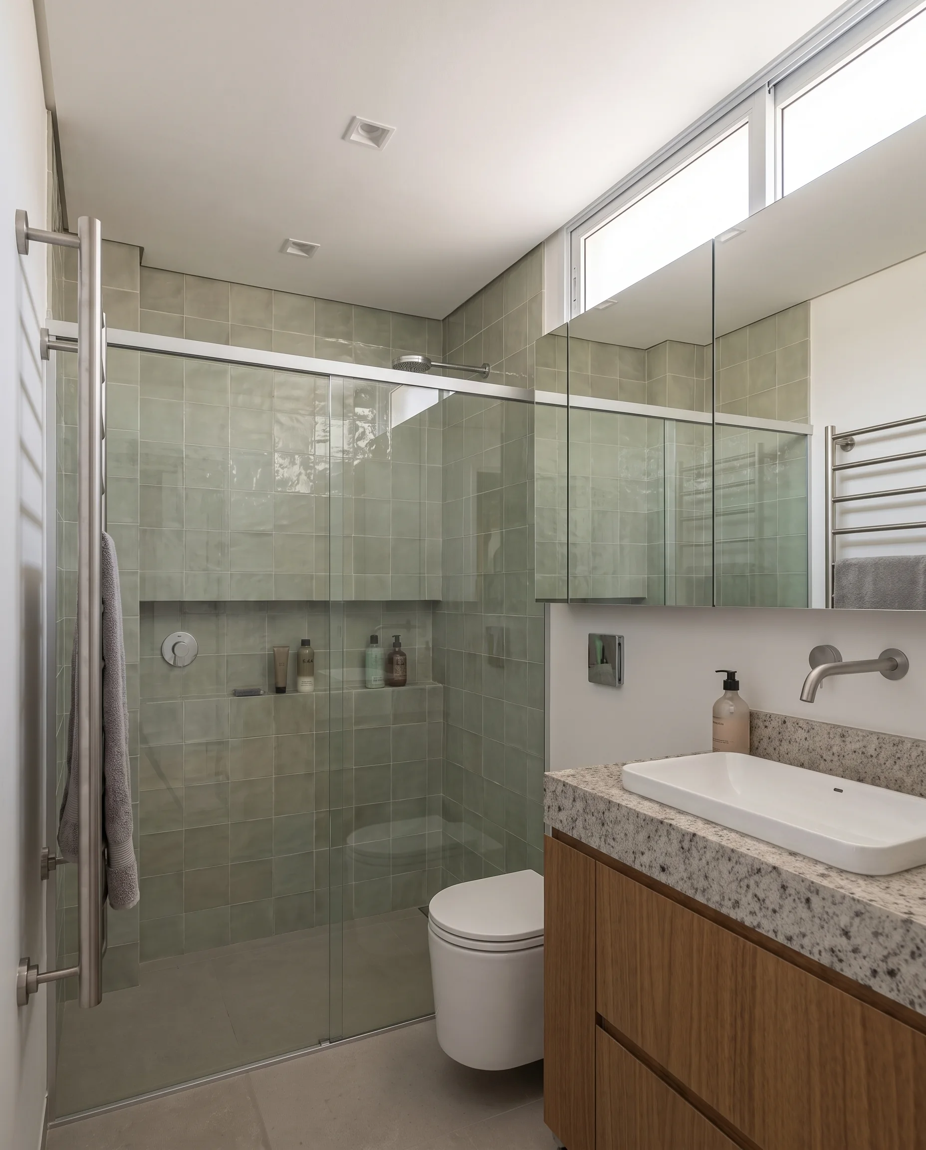 Bathroom vanity and glass shower view in Apartment LNC